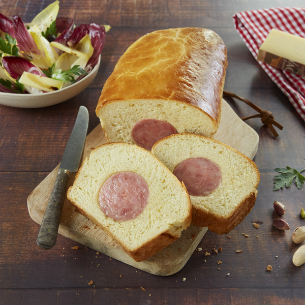 Brioché au véritable saucisson cuit de Lyon et sa salade vinaigrette d’endives au Comté et au Porto 